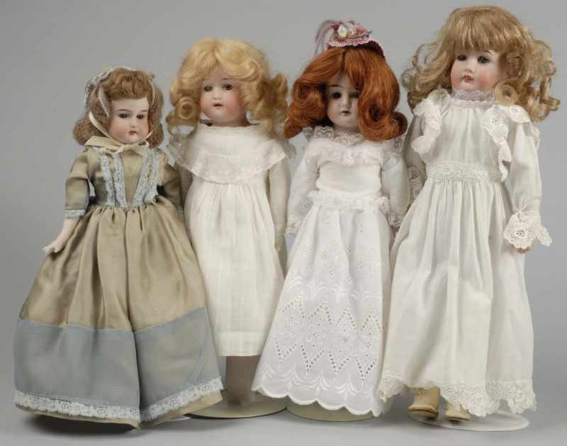 Appraisal: Lot of Sweet German Bisque Shoulder Head Dolls Description Heinrich