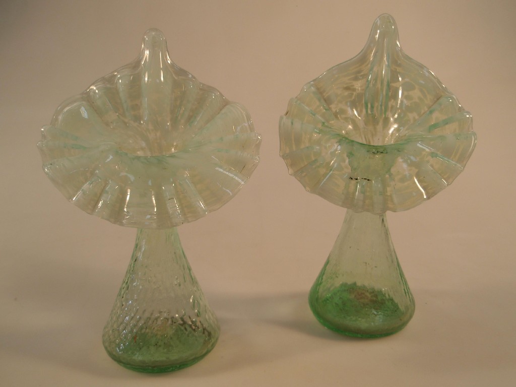 Appraisal: A pair of Victorian green glass Jack-in-the-Pulpit vases circa cm