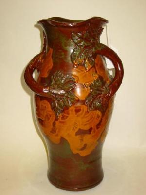 Appraisal: A LONGPARK TORQUAY TERRACOTTA VASE of inverted baluster form with