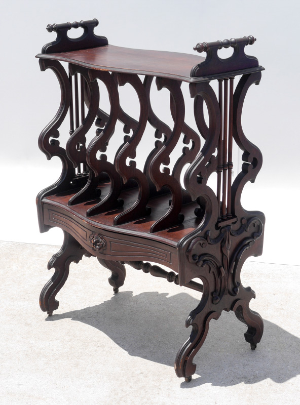 Appraisal: AMERICAN MAHOGANY CARVED CANTERBURY Late th Century Canterbury or magazine