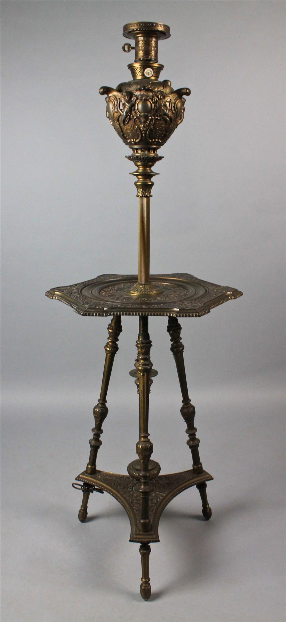 Appraisal: ORIENTALIST STYLE BRASS AND CAST METAL FLOOR LAMP AND TABLE