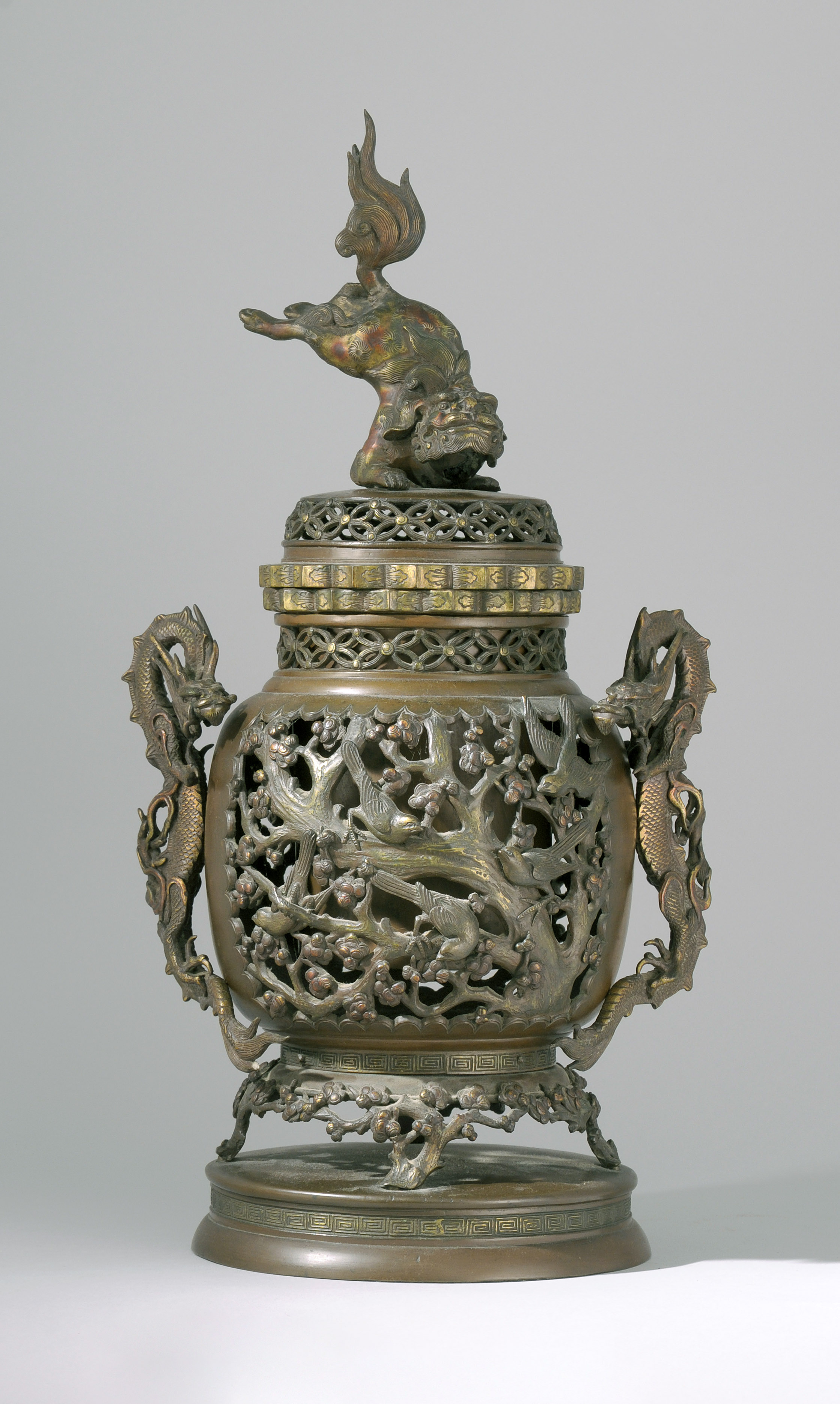 Appraisal: BRONZE URN Meiji PeriodIn ovoid form With openwork bird and