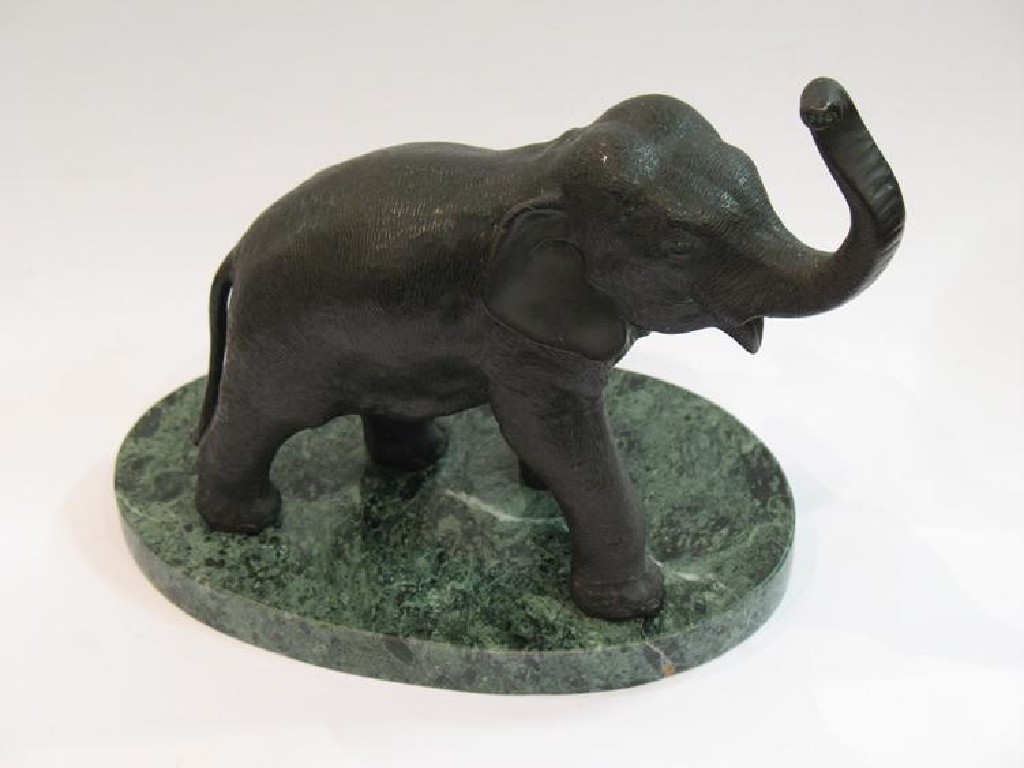 Appraisal: A JAPANESE BRONZE OF A BULL ELEPHANT with trunk raised