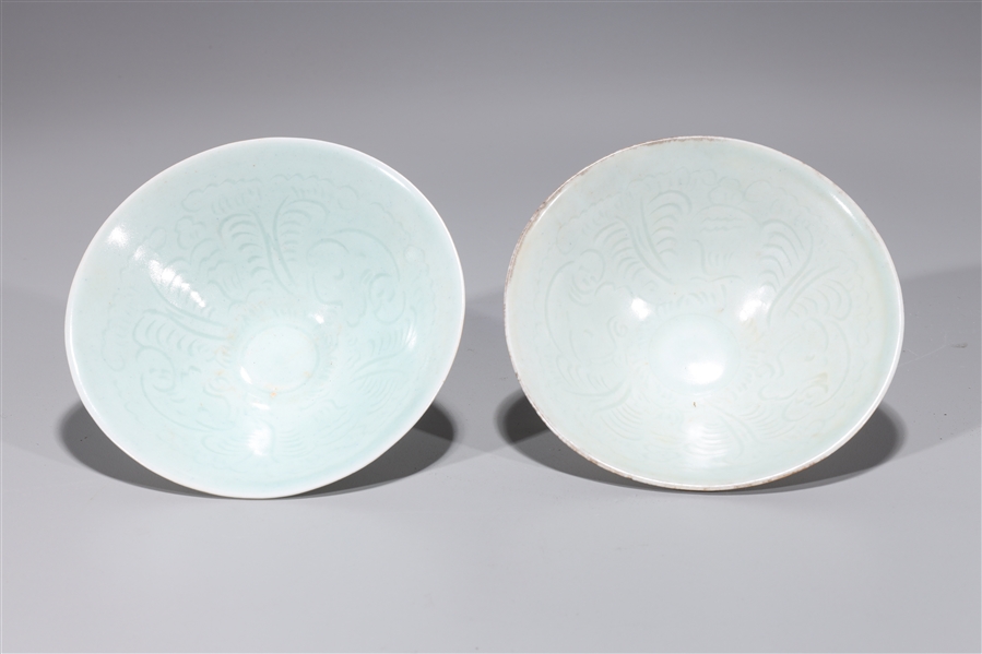 Appraisal: Pair of Chinese Song dynasty style Dingyao glaze tea bowls