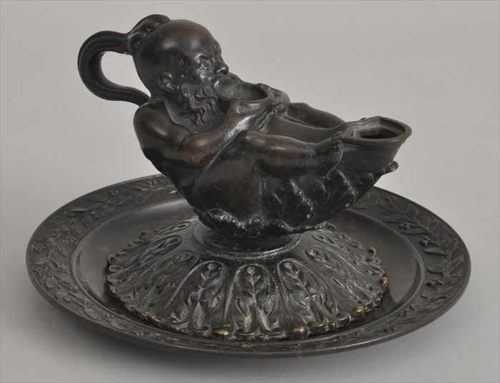 Appraisal: ITALIAN RENAISSANCE-STYLE BRONZE OIL LAMP AFTER ANDREA BRIOS Modeled as