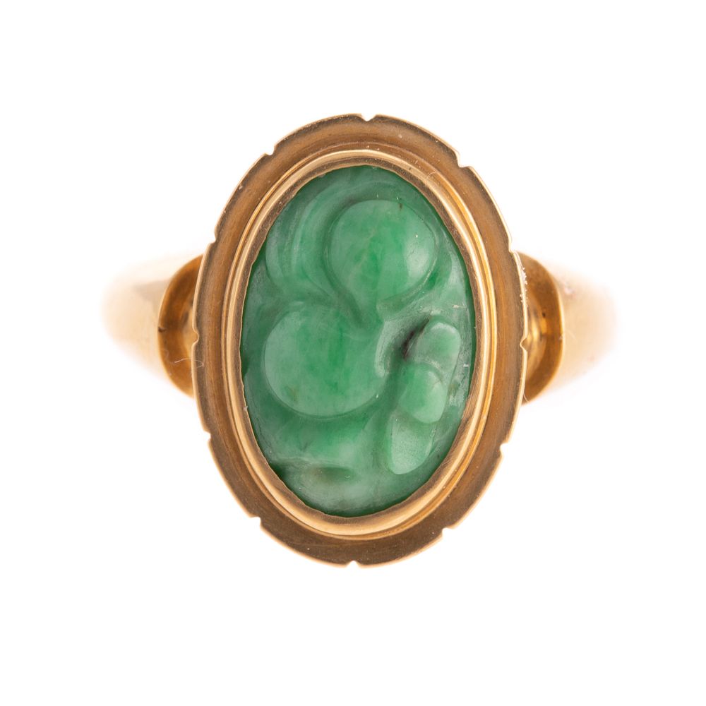 Appraisal: A Potter Mellen Carved Jade Ring in K K yellow