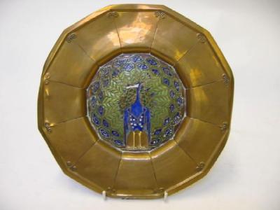 Appraisal: A WEINER WERKSTATTE STYLE BRASS PLAQUE of duodecagonal form the