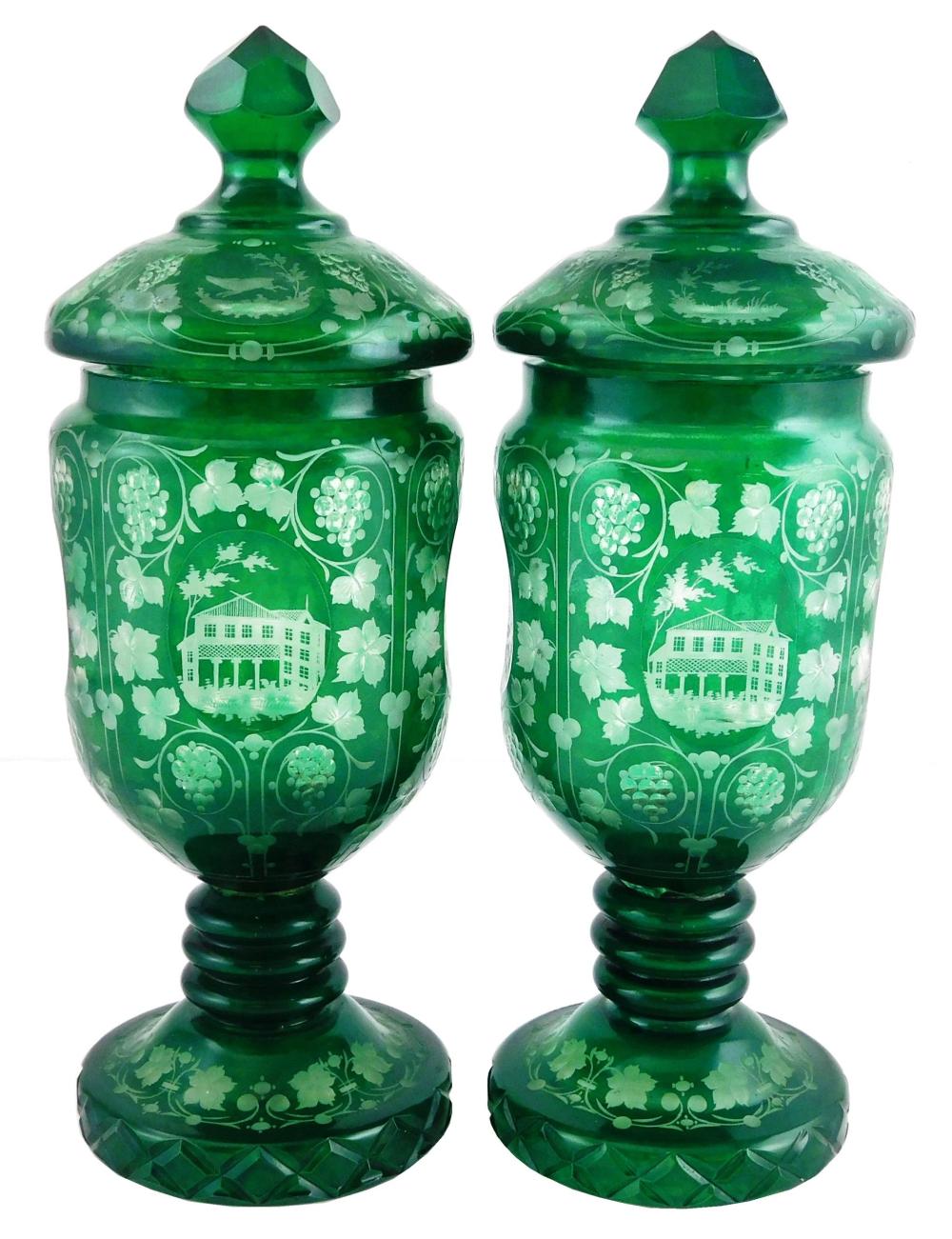 Appraisal: Pair of Bohemian glass covered urns emerald green cut to