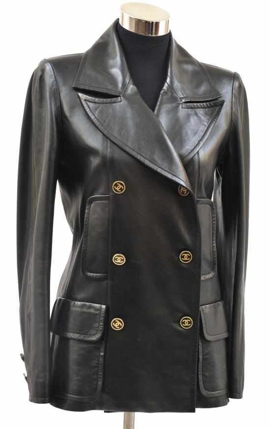 Appraisal: A BLACK LEATHER TAILORED JACKET BY CHANEL CIRCA Labelled '