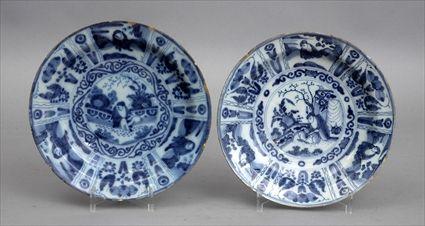 Appraisal: TWO GERMAN DELFT BLUE AND WHITE PLATES Each with chinoiserie