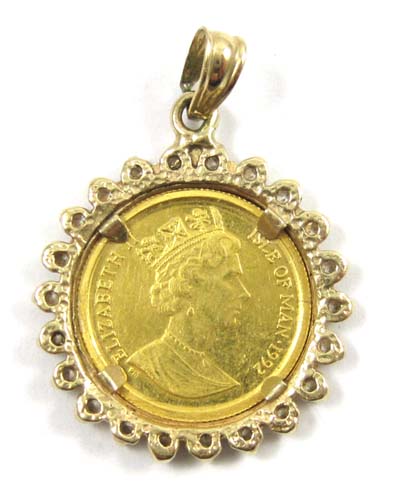 Appraisal: GOLD CAT COIN DIAMOND AND YELLOW GOLD PENDANT featuring a