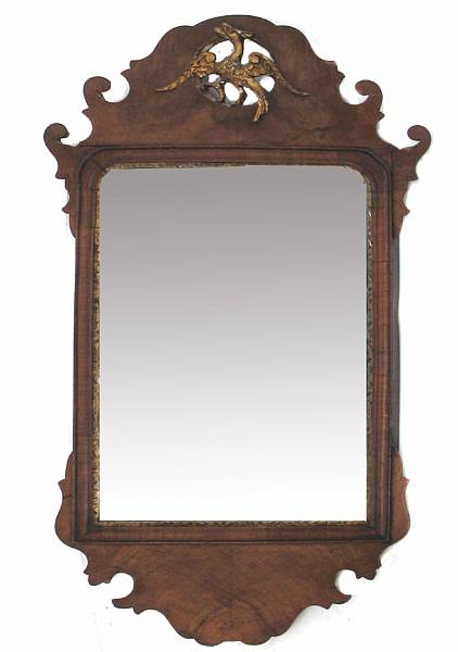 Appraisal: A George III style parcel gilt and walnut wall mirror