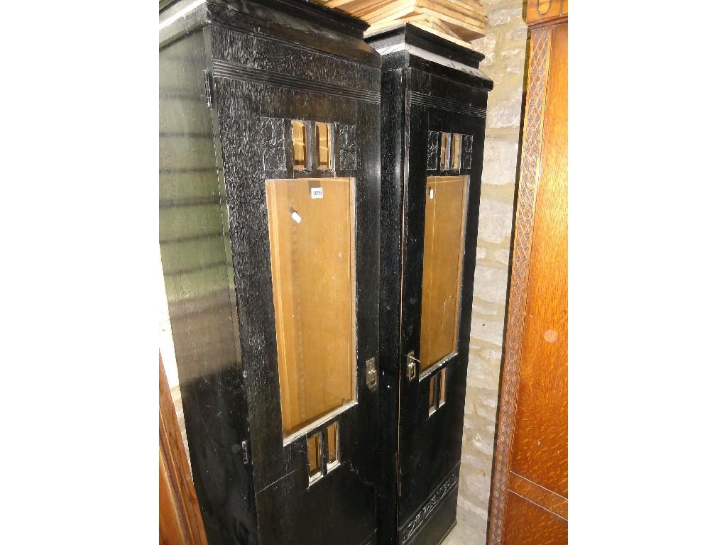 Appraisal: A pair of continental Arts and Crafts style dark stained