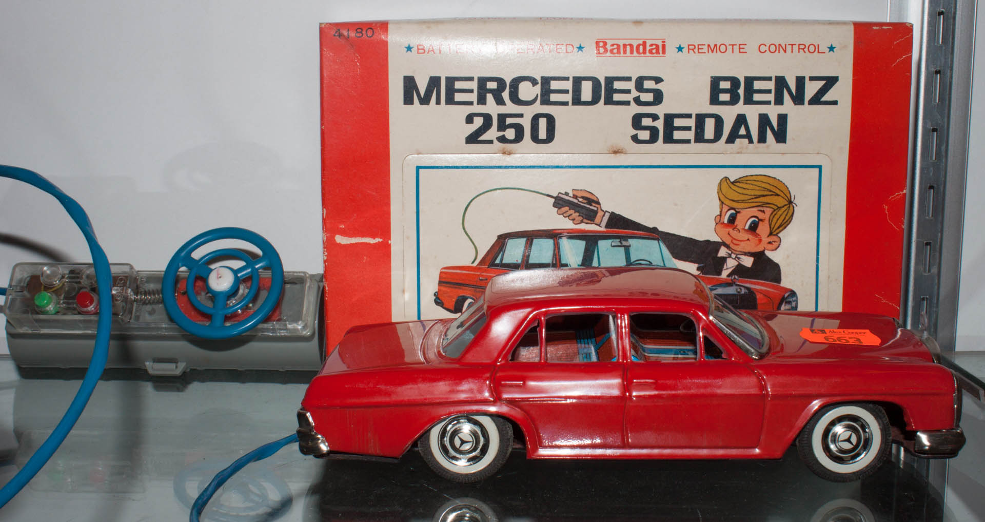 Appraisal: Bandai battery-operated tin Mercedes circa s or s red tin