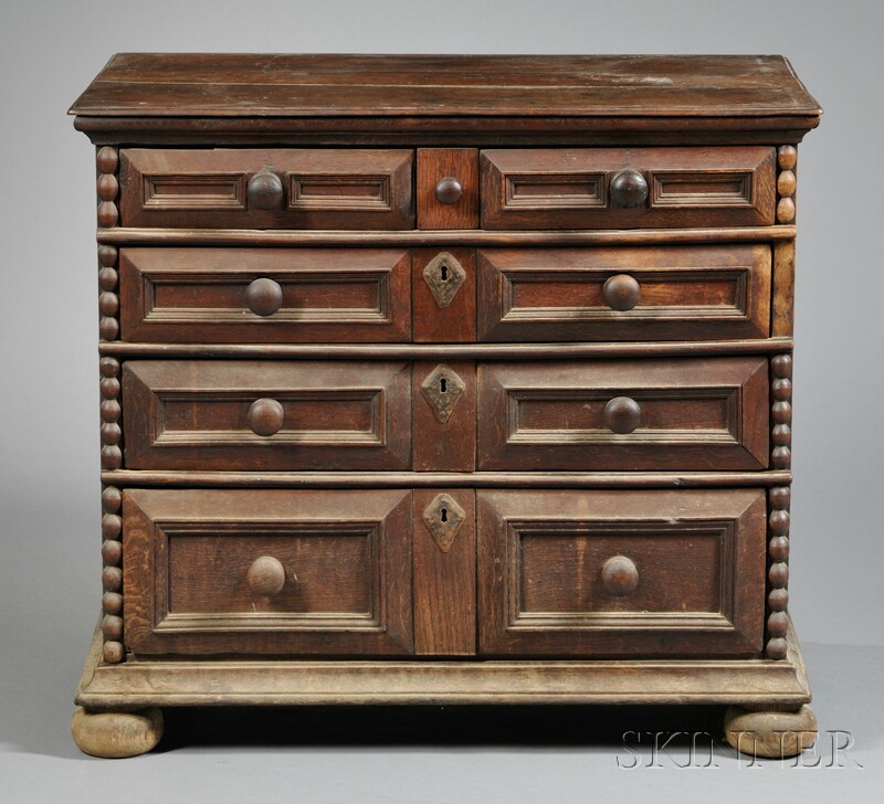 Appraisal: Oak Chest of Drawers England with a row of small