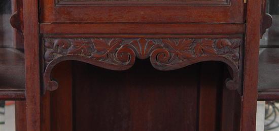 Appraisal: Walnut Etagere Turn-of-the-Century Single beveled glass door cupboard flanked by