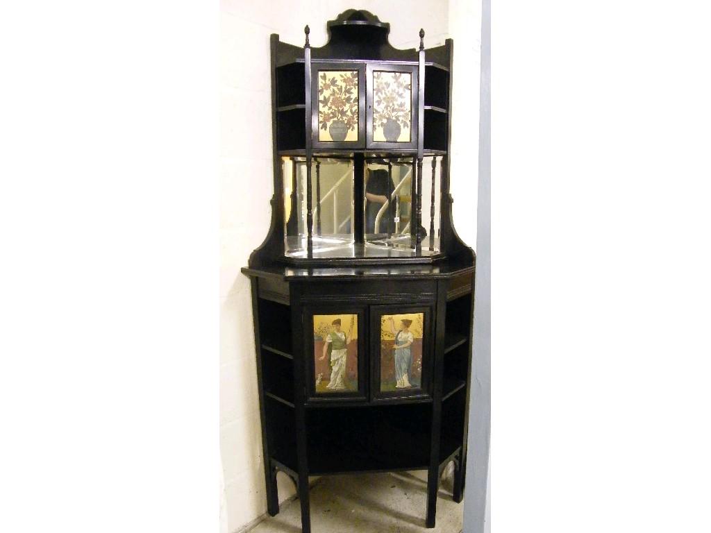 Appraisal: Decorative Aesthetic Movement ebonised standing corner cabinet the raised mirror