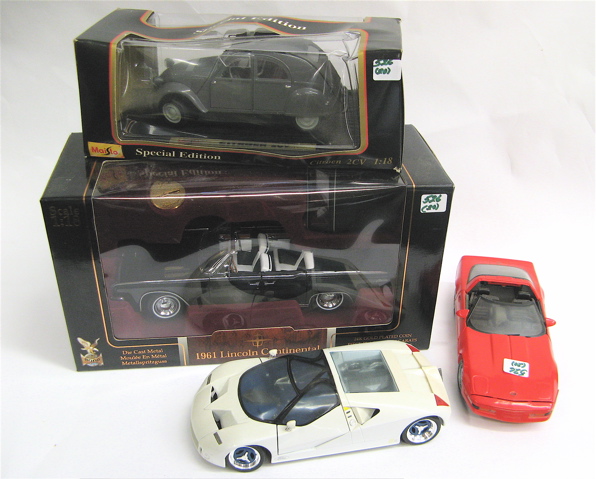 Appraisal: A COLLECTION OF TWENTY REPLICA TOY AUTOMOBILES many in scale