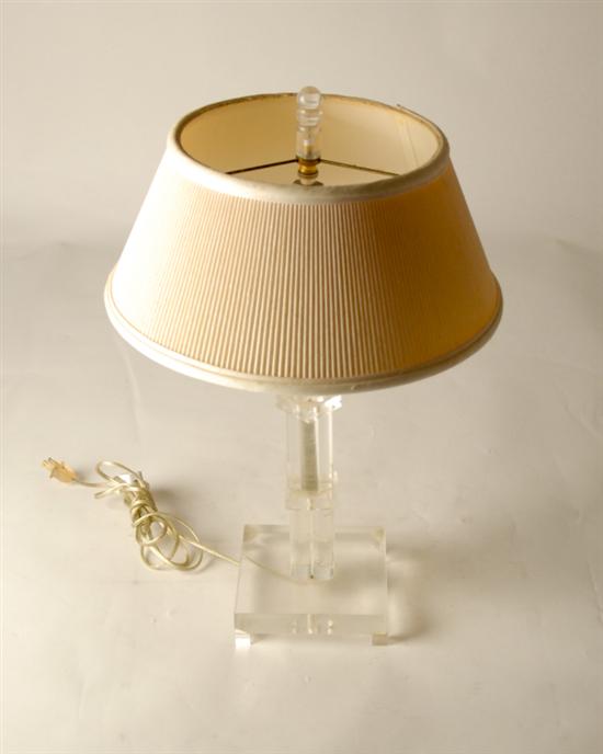 Appraisal: A Mid-Century Lucite Table Lamp clear Lucite segments stacked in