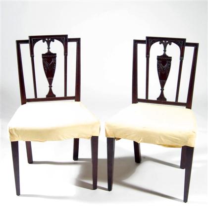 Appraisal: Pair of Federal carved mahogany chairs The steped crest with