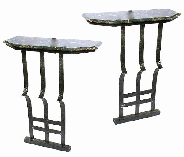 Appraisal: A pair of Art Deco style wrought iron consoles with