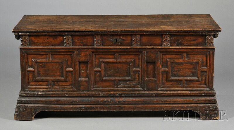 Appraisal: Paneled English Coffer th century and later with chip-carved decorative