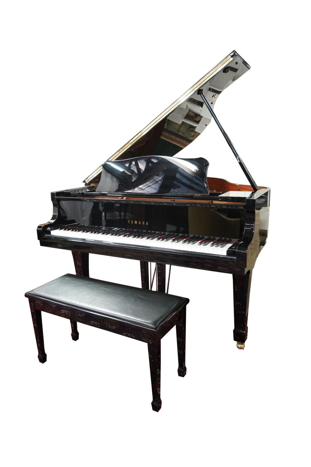 Appraisal: YAMAHA GRAND PIANOserial number black lacquer finish with bench Condition