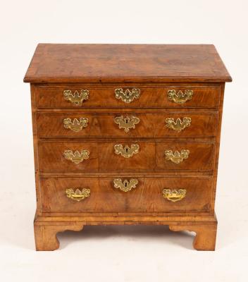 Appraisal: A George I walnut chest the crossbanded rectangular top with