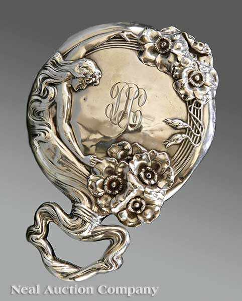 Appraisal: An American Art Nouveau Sterling Silver Hand Mirror Unger Brothers