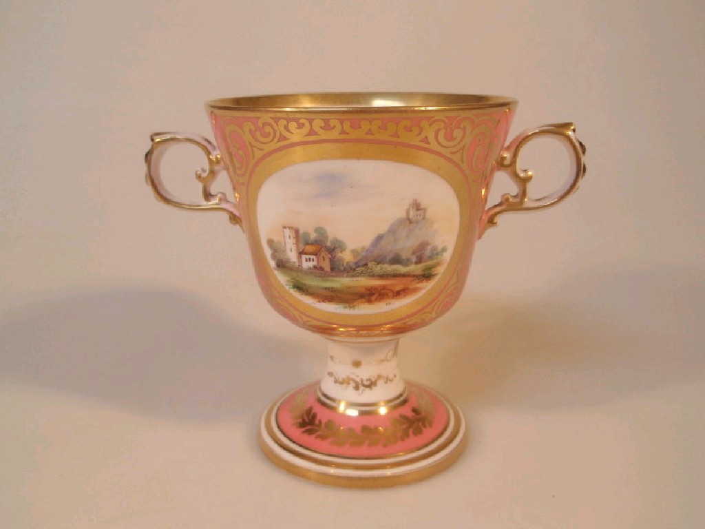 Appraisal: A mid thC porcelain two-handled loving cup painted with landscape