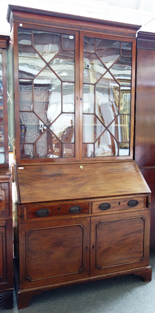 Appraisal: A made-up George III mahogany bureau bookcase the pair of