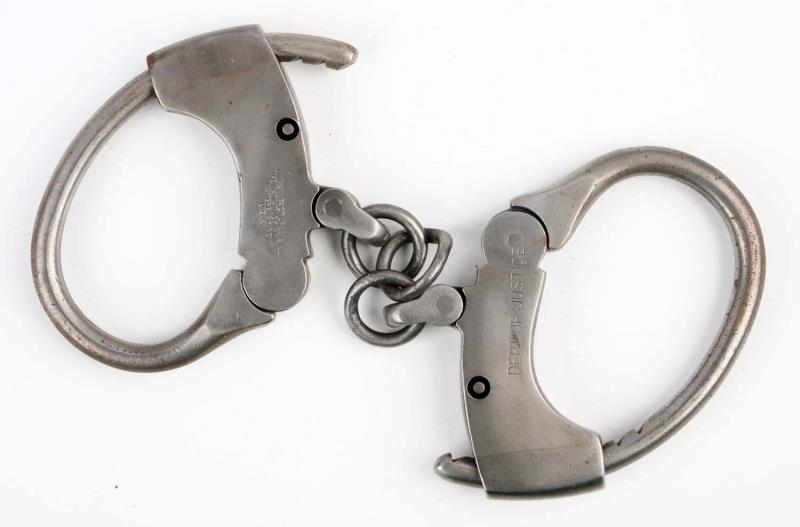 Appraisal: Judd Handcuffs No key Made by Mattatuck MF Company Stamped