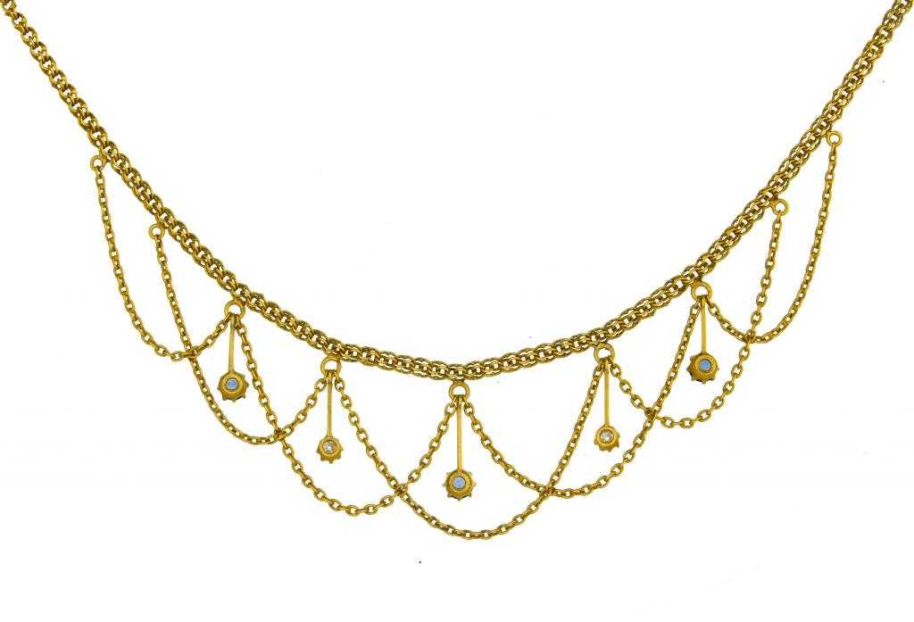 Appraisal: A SAPPHIRE AND DIAMOND FRINGE NECKLET of festoon design in