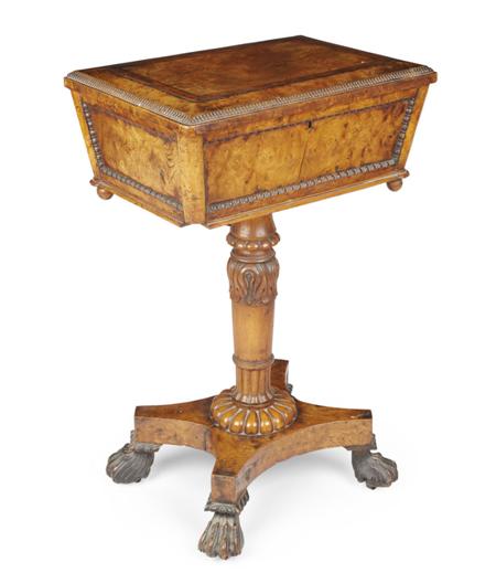 Appraisal: WILLIAM IV BURR ELM TEAPOY CIRCA the panelled sarcophagus form