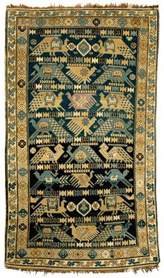 Appraisal: Caucasian rug repeating geometric elements with quadrupeds birds and stars