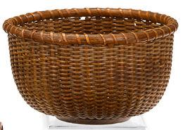 Appraisal: Circular handleless Nantucket basket early th century Three turned rings