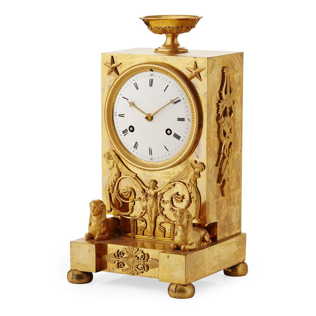 Appraisal: EMPIRE GILT BRONZE MANTLE CLOCK EARLY TH CENTURY the urn