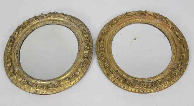 Appraisal: A pair of th th Century carved and gilded oval