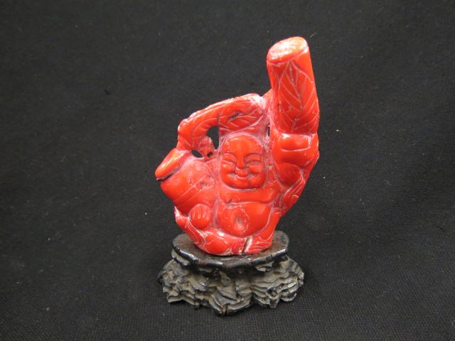 Appraisal: Chinese Carved Coral Figurine of a Buddha seated plus carved