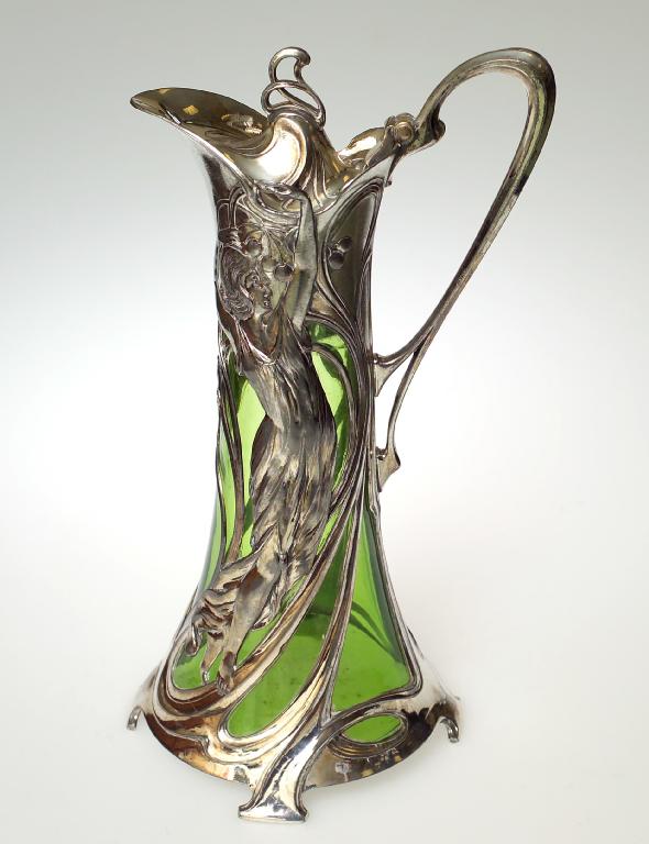 Appraisal: WMF ART NOUVEAU SILVERED PEWTER AND GREEN-GLASS CLARET JUG the