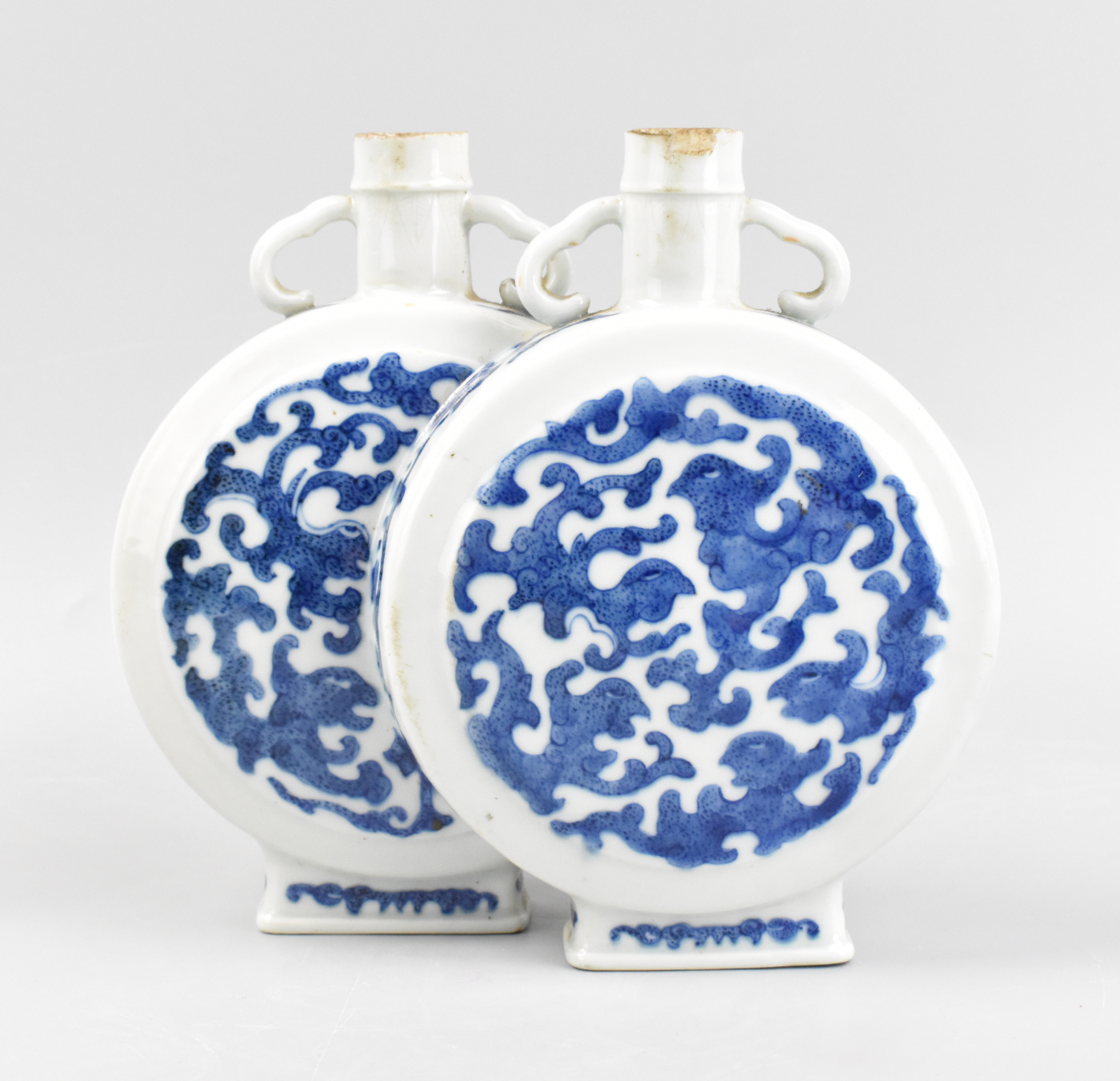 Appraisal: A Chinese blue white double moonflask vase Each overlapping vase