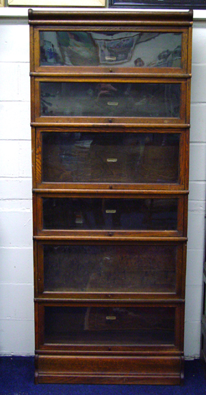 Appraisal: Globe Wernicke oak six section bookcase on cushion plinth base