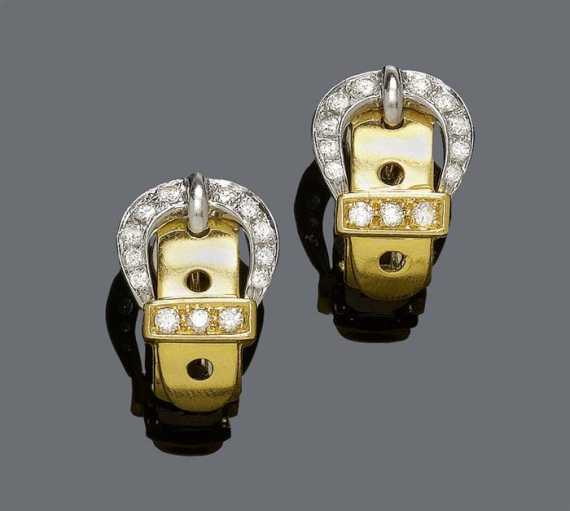 Appraisal: GOLD AND DIAMOND EARCLIPS Yellow and white gold Decorative half-creoles