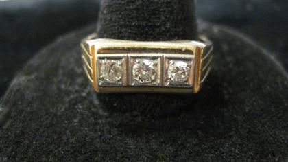 Appraisal: Gentleman's karat yellow gold and diamond ringDisplays three bezel set