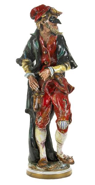 Appraisal: An Italian glazed earthenware figure of a jester height in