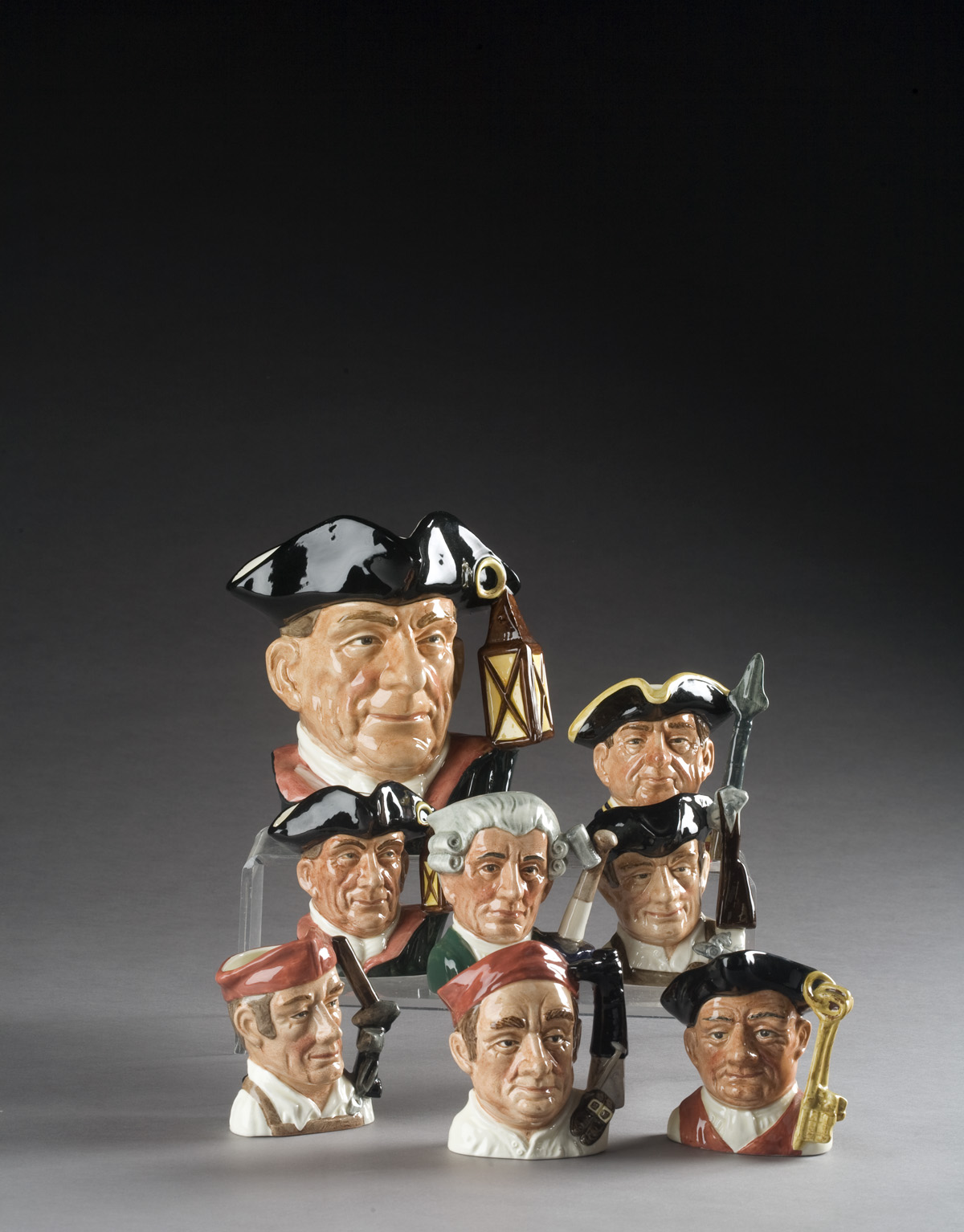 Appraisal: ROYAL DOULTON 'NIGHT WATCHMAN' TOBY JUG AND SEVEN SMALLER EXAMPLES