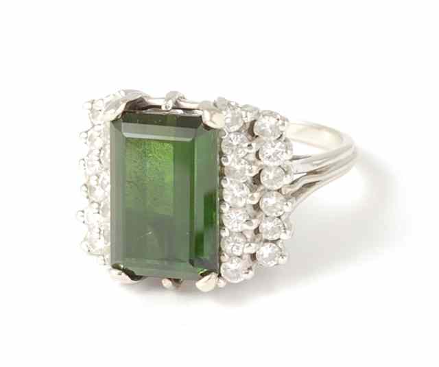 Appraisal: GREEN TOURMALINE AND DIAMOND RING K white gold with round-cut