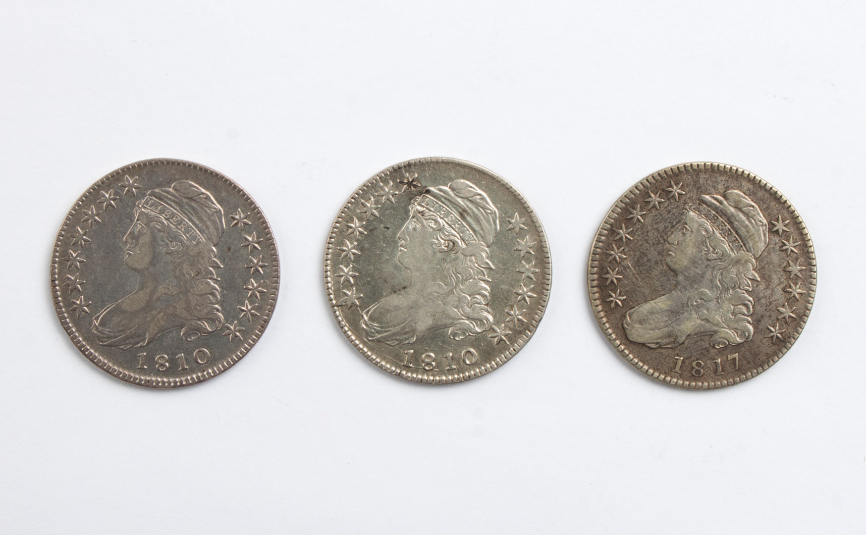 Appraisal: Three U S Capped Bust type half dollars -' comprising