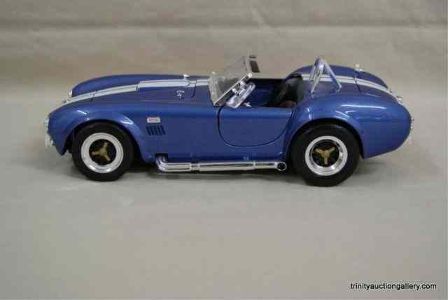 Appraisal: Shelby Cobra S C Scale Diecast Model CarThis is a