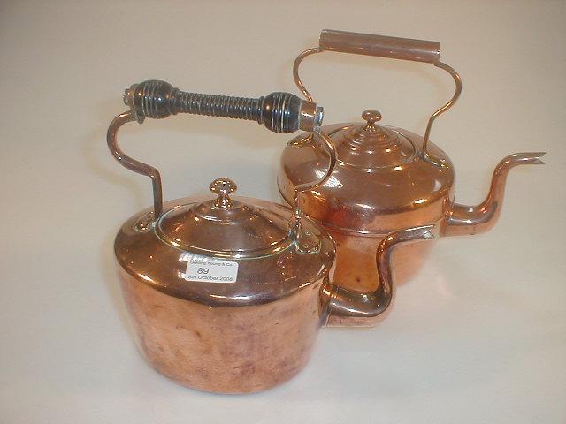 Appraisal: A thC copper kettle with a turned ebonised handle another